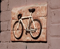 A brick bicycle on a building on Main Street in Jonesboro, Arkasnas. www.hannahandharley.com